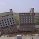 Illustration for article titled Behold, the Leaning Apartment of South Korea